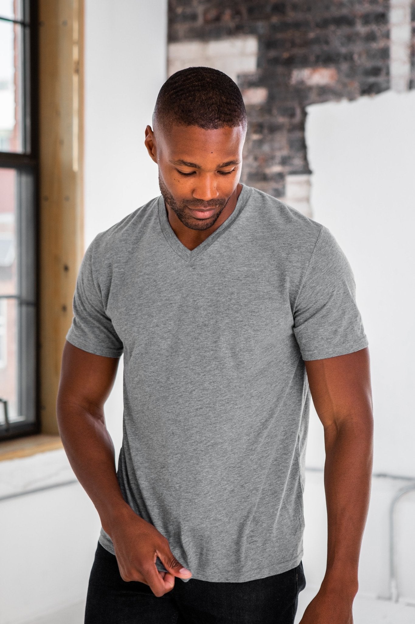 Unisex Eco - Triblend Short Sleeve V - Neck Tee - R4T$ Clothing